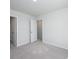 A bright bedroom showcases neutral walls and plush carpeting throughout at 205 W Bradford Pointe Dr, Summerville, SC 29483
