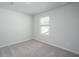 Bedroom displaying neutral walls, carpet, and a window at 205 W Bradford Pointe Dr, Summerville, SC 29483