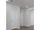 Hallway featuring neutral paint and doors at 205 W Bradford Pointe Dr, Summerville, SC 29483