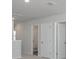 Hallway displaying doors, neutral walls, carpet and access to a bathroom at 205 W Bradford Pointe Dr, Summerville, SC 29483