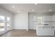Bright kitchen featuring white cabinetry, quartz countertops, and stainless steel appliances at 205 W Bradford Pointe Dr, Summerville, SC 29483