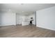 Open-concept living space with kitchen, dining area, and neutral color scheme at 205 W Bradford Pointe Dr, Summerville, SC 29483