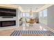 Cozy dining area showcasing large windows, scenic views, and a modern chandelier at 2105 Landfall Way, Seabrook Island, SC 29455
