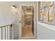 Inviting foyer featuring stained glass window, number 2105 and hardwood floors at 2105 Landfall Way, Seabrook Island, SC 29455