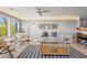 Comfortable living room with lots of natural light, light walls, and stylish furniture at 2105 Landfall Way, Seabrook Island, SC 29455