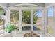 This sun-drenched sitting area features natural light and peaceful nature views at 2105 Landfall Way, Seabrook Island, SC 29455