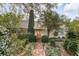 Inviting front exterior with a brick pathway and charming curb appeal at 2137 Wappoo Dr, Charleston, SC 29412
