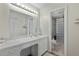 A well-lit bathroom with a vanity, and a unique glass-block shower for added appeal at 22 Monte Sano Dr, Hanahan, SC 29410