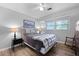 Bright bedroom with hardwood floors, ceiling fan, and natural light from the window at 22 Monte Sano Dr, Hanahan, SC 29410