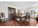 Formal dining room boasting hardwood floors, classic furnishings, and plentiful natural light at 22 Monte Sano Dr, Hanahan, SC 29410