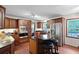 Open kitchen features stainless steel appliances, wood cabinets, and a large island at 22 Monte Sano Dr, Hanahan, SC 29410