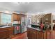 Bright kitchen with stainless appliances, granite countertops, and views to an eating area at 22 Monte Sano Dr, Hanahan, SC 29410