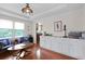 Inviting living room with a beautiful coffered ceiling, hardwood floors and a cabinet at 22 Monte Sano Dr, Hanahan, SC 29410
