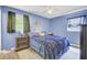 Serene bedroom featuring natural light, neutral tones, and classic wood nightstands at 225 Arbor Rd, Summerville, SC 29485