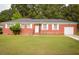 Charming brick home with a well-maintained lawn and attached garage at 250 Clarine Dr, Goose Creek, SC 29445