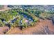Aerial view of a home in a tranquil neighborhood surrounded by lush greenery at 2524 Deer Walk Way, Mount Pleasant, SC 29466