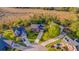 Beautiful aerial view of homes with mature trees in a serene neighborhood by the water and marshland at 2524 Deer Walk Way, Mount Pleasant, SC 29466