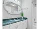 Bathroom vanity with modern fixtures, decorative mirror, and storage at 2524 Deer Walk Way, Mount Pleasant, SC 29466