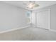 Cozy bedroom with a ceiling fan, closet, and a window providing plenty of natural light at 2524 Deer Walk Way, Mount Pleasant, SC 29466