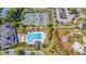 Aerial view of community amenities including a pool, tennis courts, clubhouse, parking, and green spaces at 2524 Deer Walk Way, Mount Pleasant, SC 29466