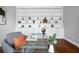 Bright office featuring custom built-ins, a glass desk, and a comfortable chair at 2524 Deer Walk Way, Mount Pleasant, SC 29466