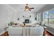 Inviting living room featuring a fireplace, comfortable seating, wood floors, and natural light at 2524 Deer Walk Way, Mount Pleasant, SC 29466