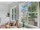 Comfortable chair and window seating area offers a relaxing view of outside deck at 2524 Deer Walk Way, Mount Pleasant, SC 29466