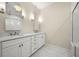 Elegant bathroom with dual vanity, marble countertops, and a luxurious shower at 2828 Olivia Marie Ln, Johns Island, SC 29455