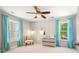 Bright bedroom featuring large windows and stylish modern furniture at 2828 Olivia Marie Ln, Johns Island, SC 29455