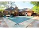 Home's backyard has covered pool and a nice deck area, ideal for relaxing and entertaining outdoors at 301 Factors Walk, Summerville, SC 29485