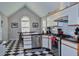 Stylish kitchen with modern stainless steel appliances and checkered flooring at 301 Factors Walk, Summerville, SC 29485