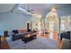 Bright living room with high ceilings, hardwood floors, and an open floor plan at 301 Factors Walk, Summerville, SC 29485