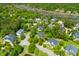 Scenic aerial view of a residential area with waterfront access and lush greenery, creating a tranquil setting at 3500 Maplewood Ln, Mount Pleasant, SC 29466