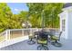 Back deck features a green umbrella and dining table at 3500 Maplewood Ln, Mount Pleasant, SC 29466