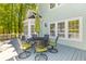 Back deck features a green umbrella and dining table at 3500 Maplewood Ln, Mount Pleasant, SC 29466