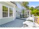 Outdoor living on a spacious deck with seating, ideal for enjoying the peaceful scenery at 3500 Maplewood Ln, Mount Pleasant, SC 29466