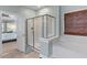 Bright bathroom featuring a glass shower, soaking tub, tile floors, and neutral paint color at 3500 Maplewood Ln, Mount Pleasant, SC 29466