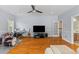 A large bonus room showcasing an abundance of seating, media center, and lots of natural light at 3500 Maplewood Ln, Mount Pleasant, SC 29466