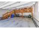 Organized garage with ample storage, including a loft area and room for vehicles at 3500 Maplewood Ln, Mount Pleasant, SC 29466