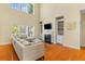 Bright living room featuring a fireplace, built-in shelves and a large sofa at 3500 Maplewood Ln, Mount Pleasant, SC 29466