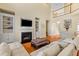 Cozy living room with a fireplace, built-in shelves, and comfortable seating arrangement at 3500 Maplewood Ln, Mount Pleasant, SC 29466