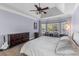 Comfortable main bedroom with trey ceiling, plenty of natural light, and stylish furniture at 3500 Maplewood Ln, Mount Pleasant, SC 29466