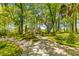 Beautiful walking path surrounded by trees, offering a tranquil and picturesque setting at 3500 Maplewood Ln, Mount Pleasant, SC 29466