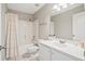 Clean, white bathroom with a shower and bathtub combo, complemented by a vanity with ample counter space at 3526 Stockton Dr, Mount Pleasant, SC 29466