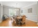 Elegant dining room with hardwood floors and a large window for natural light at 3526 Stockton Dr, Mount Pleasant, SC 29466