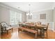 Elegant dining room with hardwood floors and a large window for natural light at 3526 Stockton Dr, Mount Pleasant, SC 29466