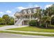 Charming two-story home with manicured lawn and driveway in established neighborhood at 3526 Stockton Dr, Mount Pleasant, SC 29466