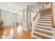 Spacious foyer with hardwood floors, lots of natural light, and staircase at 3526 Stockton Dr, Mount Pleasant, SC 29466