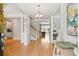 Spacious foyer boasts hardwood floors, a chandelier, and beautiful staircase at 3526 Stockton Dr, Mount Pleasant, SC 29466