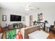 Inviting living room with a large TV, modern decor, and a ceiling fan at 3526 Stockton Dr, Mount Pleasant, SC 29466